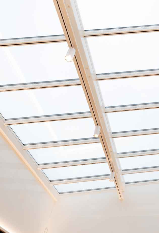 Tageslicht-Lösung mit VELUX Modular Skylights als Stufen-Lichtband 5° / Shopping Center Herblingertal, Schaffhausen / Schweiz / Innenansicht vom Produkt 