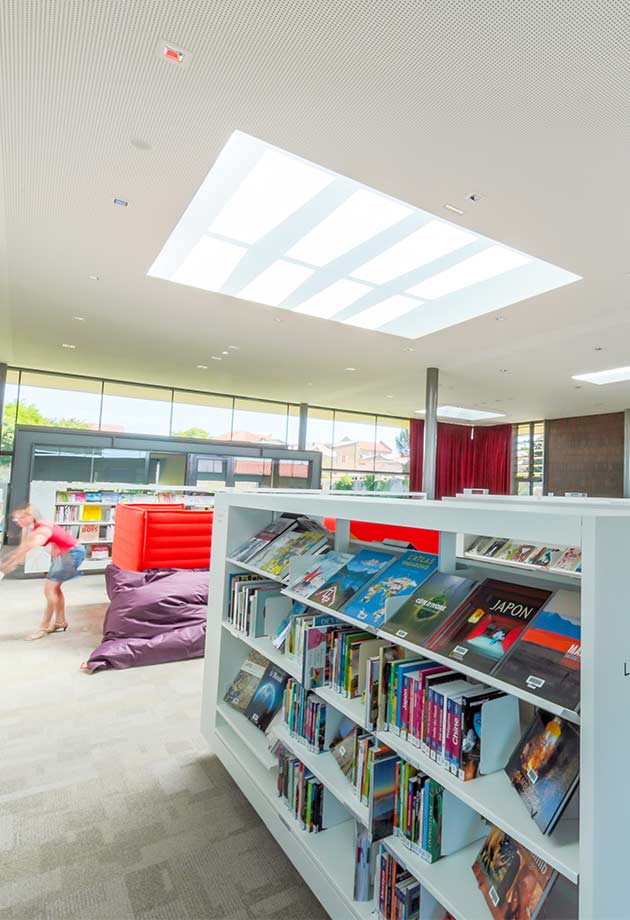 Interior view of the light contribution by Ridgelight and Longlight skylights, Lezoux Media Library, France 