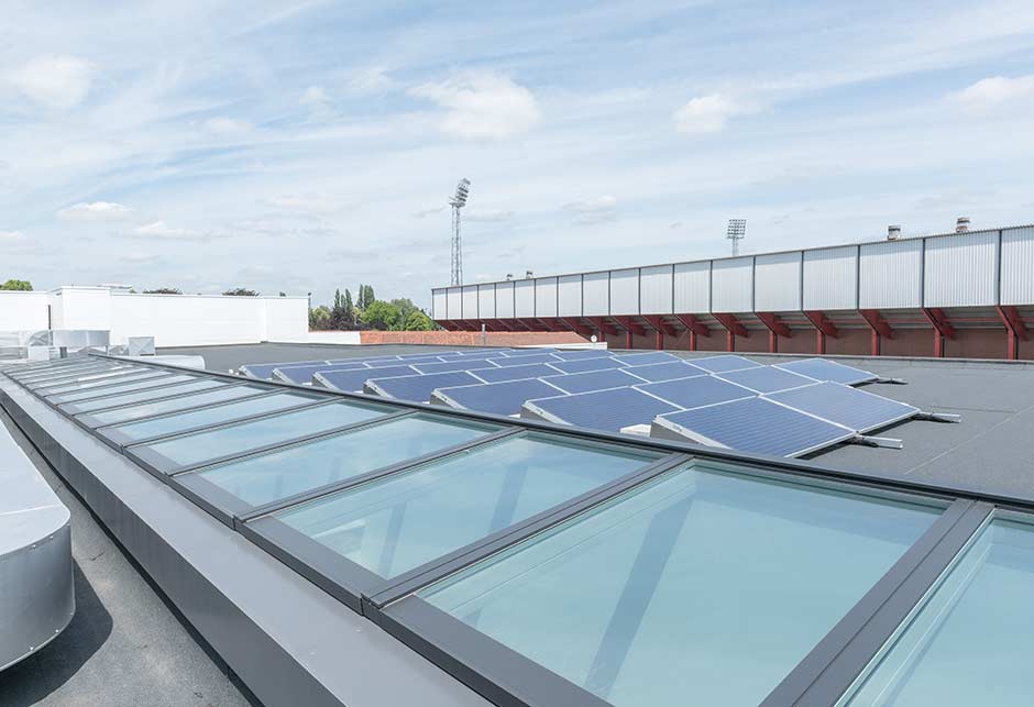 External view of VELUX longlight 5° at the Monserez car showroom, Belgium